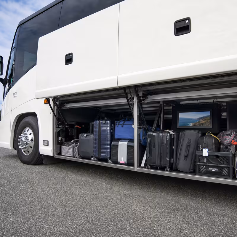 Party bus interior with wraparound leather seating and LED lighting in Boca Raton